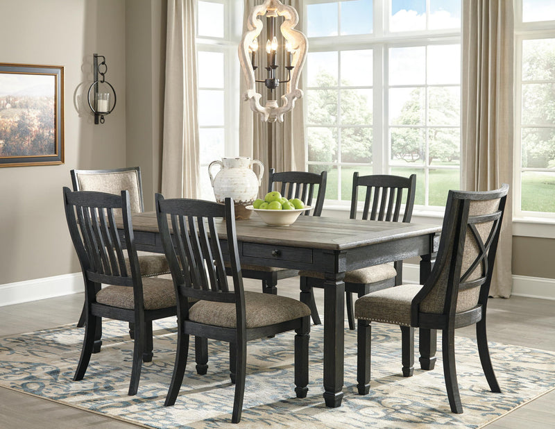 Set of two Signature Design by Ashley Tyler Creek dining UPH side chairs with slatback in black and grayish brown finish.