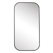 Uttermost Taft wall mirror with a sleek, modern design showcasing a reflective glass surface and stylish frame.