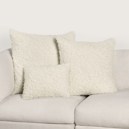 Ivory Carters accent pillow measuring 22x22 inches by Classic Home, with soft fabric and decorative design for living room decor.