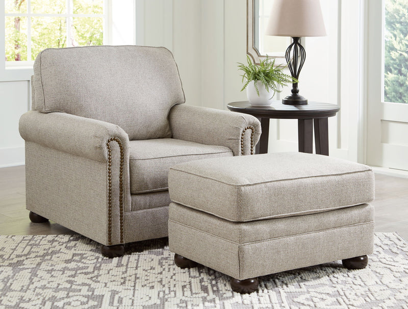Signature Design by Ashley Gaelon living room set featuring a stationary chair and matching ottoman in a modern, comfortable style.
