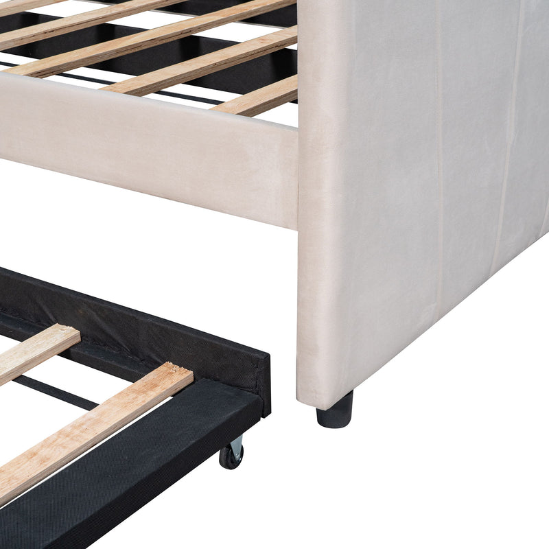 DreamHaus upholstered daybed sofa bed with trundle and wood slat base, showcasing its plush fabric and sturdy construction.
