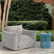 TOV Furniture Rafa outdoor side table with a sleek black metal frame and round wooden top, ideal for patio or garden spaces.