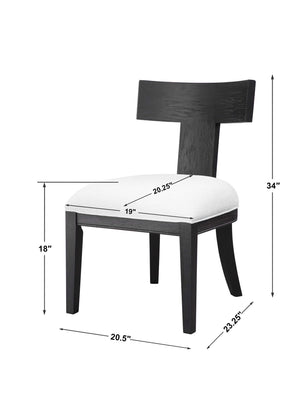 Uttermost Idris armless side chair with upholstered seat and wooden legs, modern design for living or dining room decor.