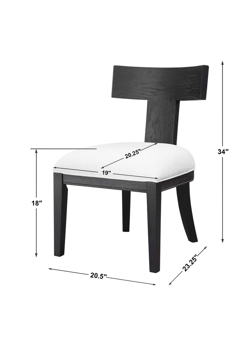 Uttermost Idris armless side chair with upholstered seat and wooden legs, modern design for living or dining room decor.