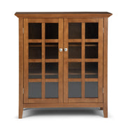 Handcrafted Acadian medium storage cabinet by Simpli-Home featuring a natural wood finish and classic accent cabinet design.