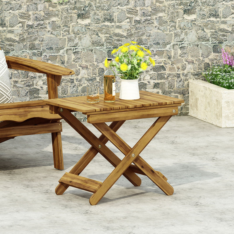 Noble House outdoor folding wooden side table with slatted surface and foldable design for patio or garden use.