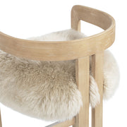 Jennifer Taylor Home Millwick low back counter stool with wood legs and upholstered seat for counter height seating.