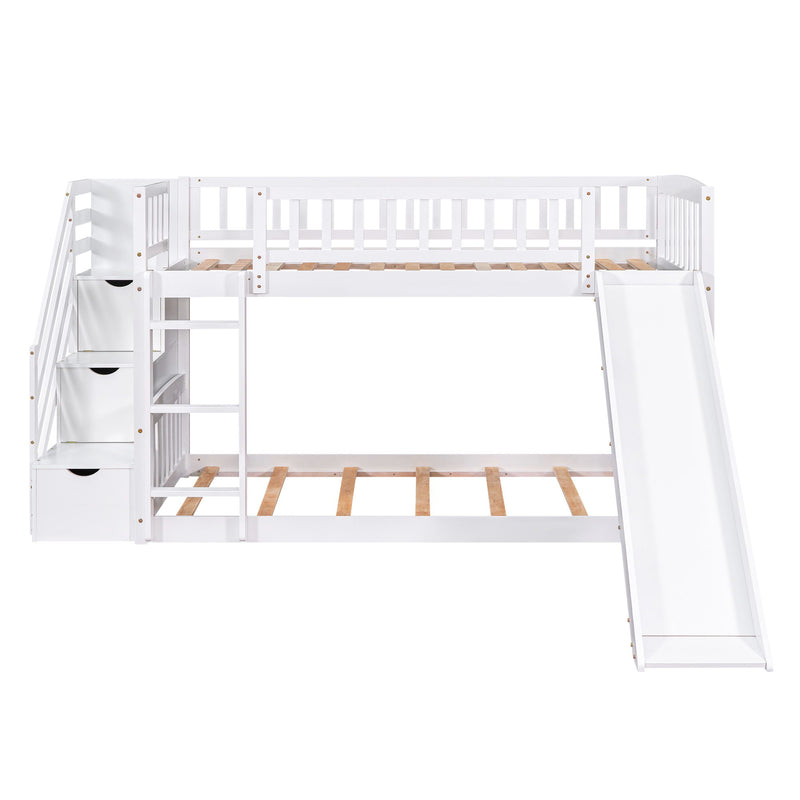DreamHaus twin over twin stairway bunk bed with two drawers and slide, featuring sturdy wood construction and a fun play slide.