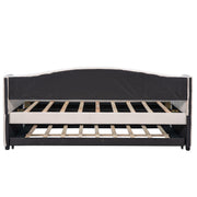 DreamHaus upholstered daybed sofa bed with trundle and wood slat base, showcasing its stylish design and functional sleeping space.