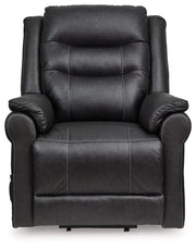 Signature Design by Ashley Oatman power lift recliner in plush fabric, showing the chair extended with adjustable footrest and backrest