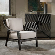 Uttermost Lyle beige accent arm chair with plush upholstery and curved wooden legs for stylish seating.