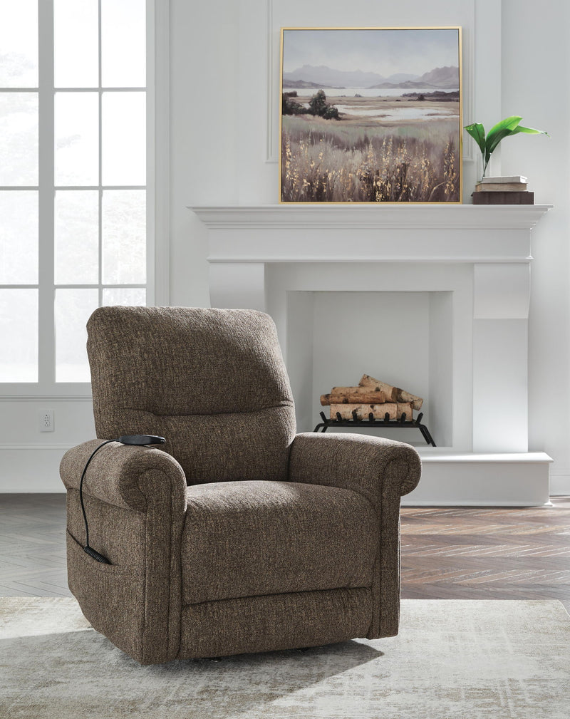 Aureta Power Lift Recliner by Signature Design Ashley in plush fabric, showing the chair's ergonomic design and control panel.