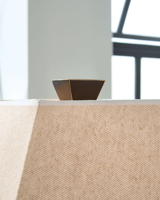 Pair of Deidra table lamps by Signature Design by Ashley® with fabric shades and sleek bases, set of two for stylish lighting.