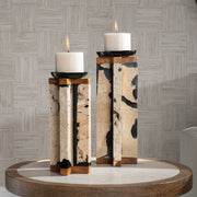 Set of two black and white stone candleholders from Uttermost Illini collection, perfect for candles and home decor.