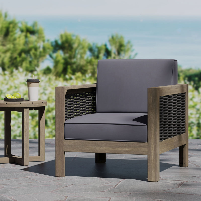 Noble House outdoor acacia wood arm chair with wicker accents, featuring a sturdy frame and comfortable seating for outdoor spaces.