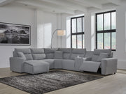 Signature Design by Ashley Modmax II reclining sectional in salt and pepper fabric with plush cushions and reclining seats.