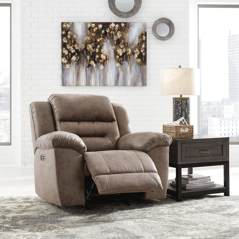 Signature Design by Ashley power recliner rocker chair with plush upholstery and modern design, perfect for relaxing comfort.