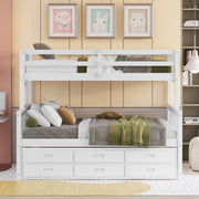 DreamHaus bunk bed with twin-sized top bed, under-bed trundle, and built-in storage drawers in a cozy bedroom setting.