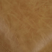 Pair of Uttermost Conifer dining chairs with wooden legs and upholstered seats, shown from a front angle.