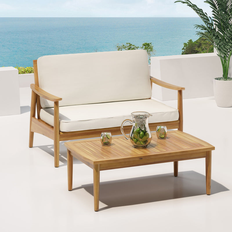 Noble House outdoor acacia wood loveseat set with matching coffee table, 2-piece outdoor furniture for patio or garden.