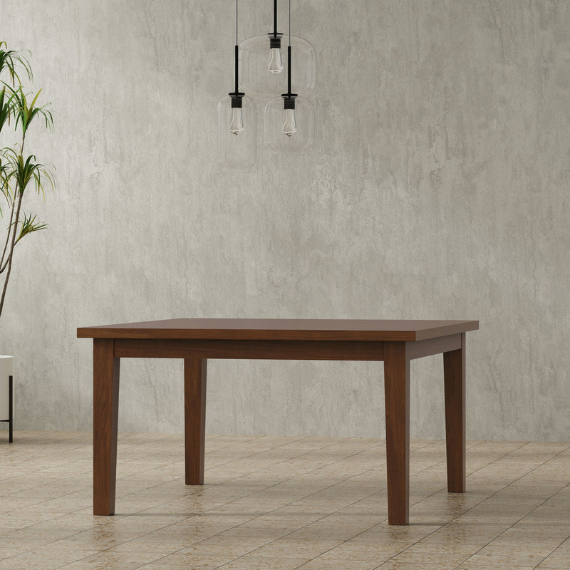 Simpli-Home Eastwood handcrafted dining table with wooden surface and sturdy legs, ideal for modern dining rooms.