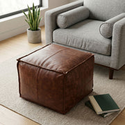 Handcrafted Sheffield square accent pouf by Simpli-Home featuring soft fabric upholstery and a sturdy square shape.