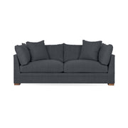 Classic Home Audrey stationary sofa with plush cushions and elegant design, showcased in a cozy living room setting.