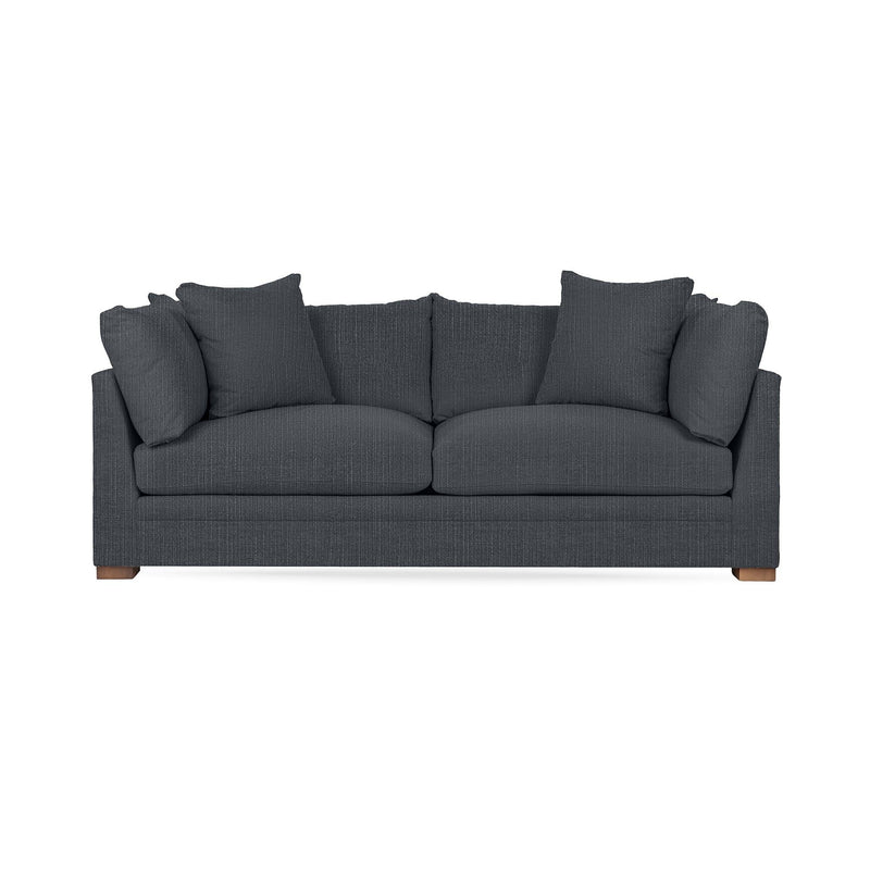Classic Home Audrey stationary sofa with plush cushions and elegant design, showcased in a cozy living room setting.