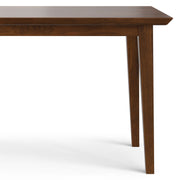 Contemporary Colby dining table by Simpli-Home with a smooth wooden surface and sturdy legs, ideal for modern dining rooms.