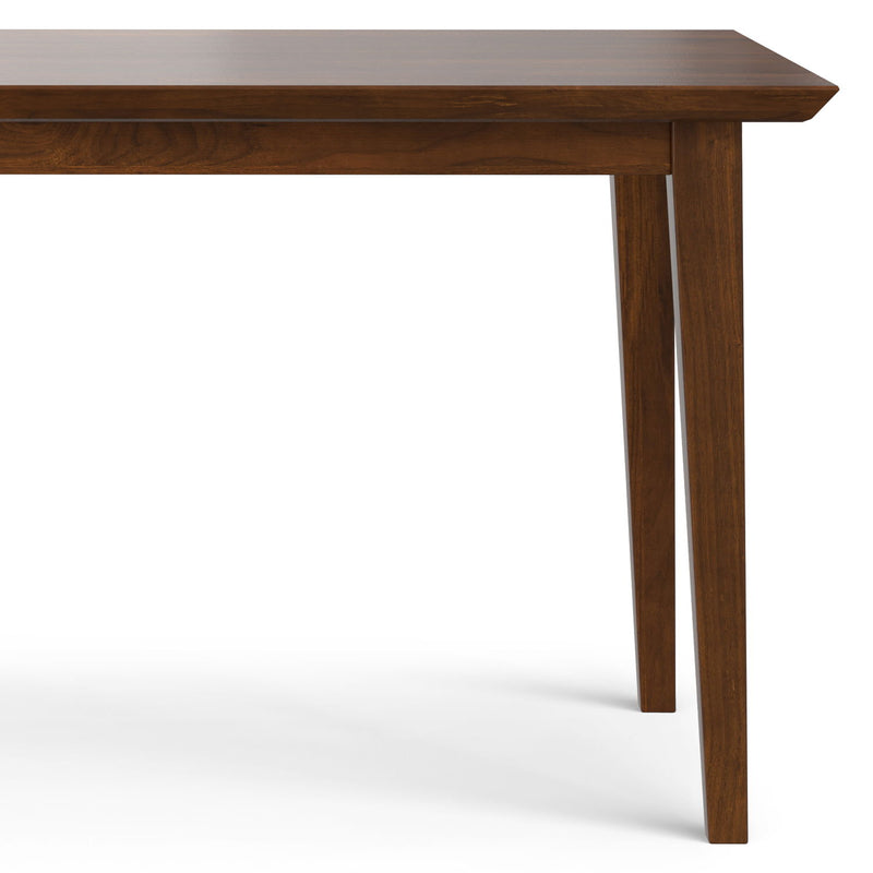 Contemporary Colby dining table by Simpli-Home with a smooth wooden surface and sturdy legs, ideal for modern dining rooms.