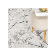 Geometrix - 7'10" X 10'6" Area Rug, Geometric 3D Effect - Ivory / Gray - R&R Furniture Gallery (Fountain Valley, CA)