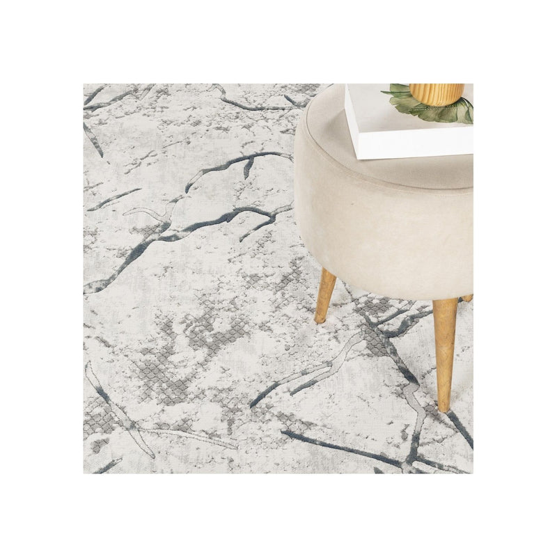 Geometrix - 7'10" X 10'6" Area Rug, Geometric 3D Effect - Ivory / Gray - R&R Furniture Gallery (Fountain Valley, CA)