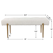 Uttermost Olivier accent bench with cushioned top and wooden legs, ideal for entryways or living room decor.