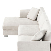 Luxe & Co. modern cloud L-shaped sectional sofa set with oversized chaise, four seats, and two decorative pillows in a contemporary living room