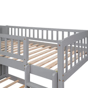 Gray twin over twin bunk bed with stairway, built-in drawers, and slide from DreamHaus, featuring safety rails and a sturdy frame.