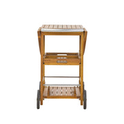 Teak outdoor bar cart with foldable tabletop and removable trays, ideal for outdoor storage and entertaining.