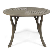 Noble House Hermosa outdoor acacia wood circular dining table with a sturdy design and smooth surface for outdoor dining.