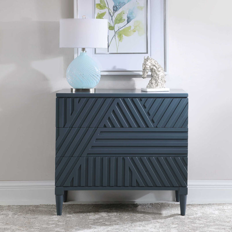 Uttermost Colby accent drawer chest with dark wood finish and modern design, featuring multiple drawers and sleek hardware.