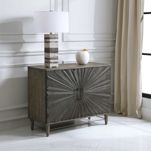 Gray Oak Shield 2-door accent cabinet by Uttermost with sleek design and modern hardware, showcasing its stylish exterior.