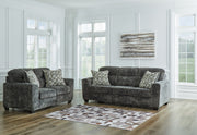 Signature Design by Ashley Lonoke living room set featuring stationary sofas and loveseats with plush cushions and contemporary style.