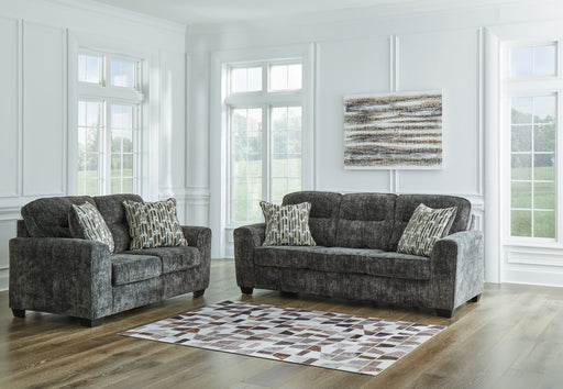 Signature Design by Ashley Lonoke living room set featuring stationary sofas and loveseats with plush cushions and contemporary style.