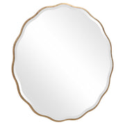 Uttermost Aneta round wall mirror with a sleek frame, hanging on a wall, showcasing its modern design and reflective surface.