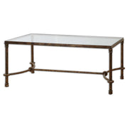 Uttermost Warring iron coffee table with a rustic metal finish and open-frame design, ideal for modern living spaces.