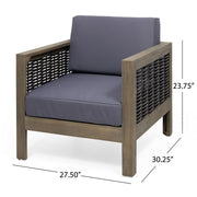 Outdoor acacia wood club arm chair with wicker accents by Noble House, featuring a sturdy frame and woven design for outdoor seating.