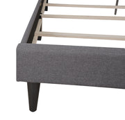 Upholstered tufted bed by Glory Furniture with button-tufted headboard, cozy design, perfect for stylish bedroom decor.