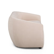 TOV Furniture Jordan stationary loveseat with plush upholstery and modern design, shown in a cozy living room setting.