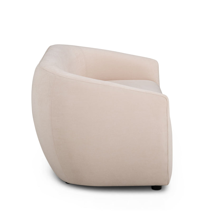 TOV Furniture Jordan stationary loveseat with plush upholstery and modern design, shown in a cozy living room setting.