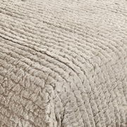 Velvet quilt set with matching shams from Classic Home Bari collection, featuring plush, luxurious fabric in a cozy bedroom setting.