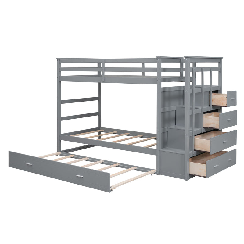 DreamHaus bunk bed with trundle and staircase, featuring sturdy wooden frame, ladder, and space-saving design for kids' room.