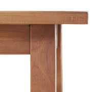 Noble House Kinesis outdoor side table with slatted top and wood frame, ideal for patio or garden seating areas